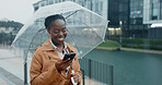 Happy, black woman and phone with umbrella for rain weather, communication and social media of security. Smile, female person and mobile for texting, search location and taxi app of travel outdoor