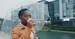 Outdoor, black woman and thinking with umbrella or coffee in rainy weather for commuting or travel to work. Female person, employee or professional and tea in city with water drops on journey