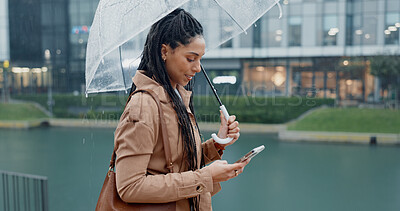 Buy stock photo Business, woman and phone with umbrella for rain weather, communication and social media of security. Smile, female person and mobile for texting, search location and taxi app of travel outdoor