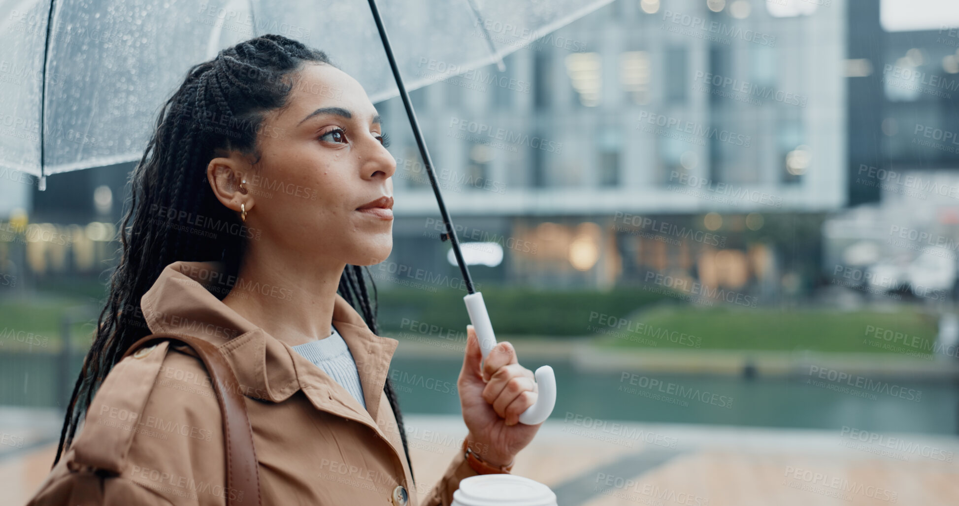 Buy stock photo Outside, woman and thinking with umbrella or coffee in rainy weather for commuting or travel to work. Female person, employee or professional and profile with tea in city with water drops on journey