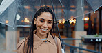 Portrait, happy and business woman with umbrella in city for security or bokeh. Face, smile and person with parasol outdoor for wet weather, rain protection and safety with insurance agent in Brazil