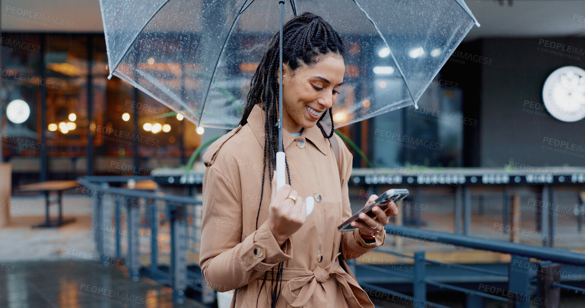 Buy stock photo Outdoor, woman and happy on smartphone with umbrella for rain with text message and notification. Female person, employee and laughing in winter on internet for social media, funny videos or memes 