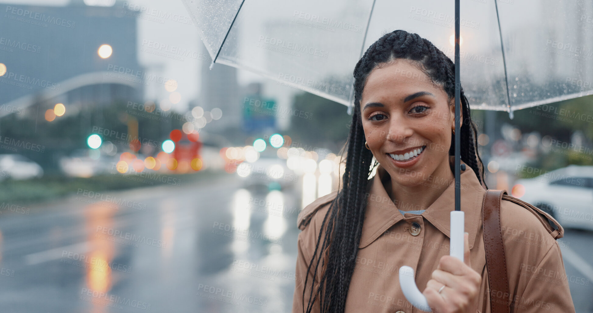 Buy stock photo Portrait, rain and happy woman with umbrella in city for travel or security in Nigeria. Face, smile or girl with parasol outdoor for wet winter weather, bokeh or business insurance with African agent