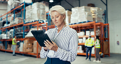 Buy stock photo Logistic, mature woman and tablet for ecommerce in warehouse, quality control or stock management. Engineer, tech and maintenance in freight, supply chain or factory at shipping company as supervisor