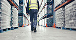 Walking, warehouse and back of logistics worker with quality assurance, stock control or inspection duty. Ecommerce, industry and distribution manager in supply chain factory for export or delivery.