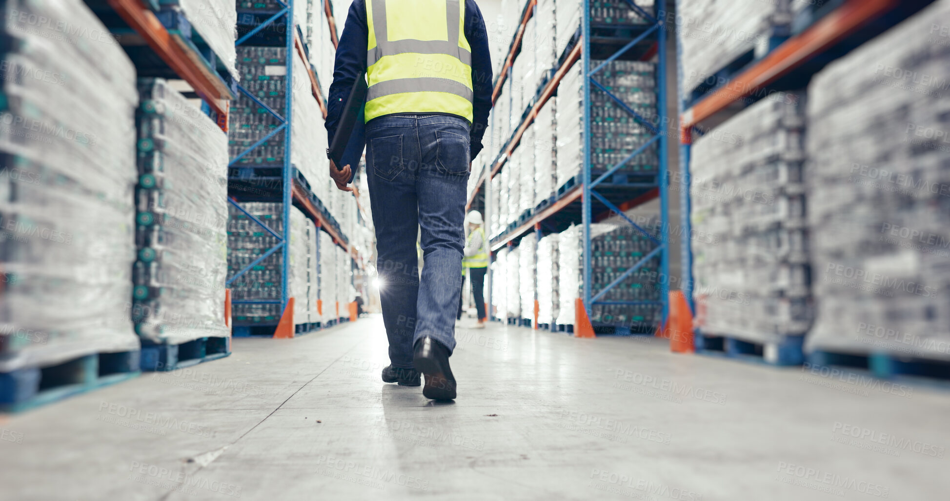 Buy stock photo Walking, warehouse and back of logistics worker with quality assurance, stock control or inspection duty. Ecommerce, industry and distribution manager in supply chain factory for export or delivery.