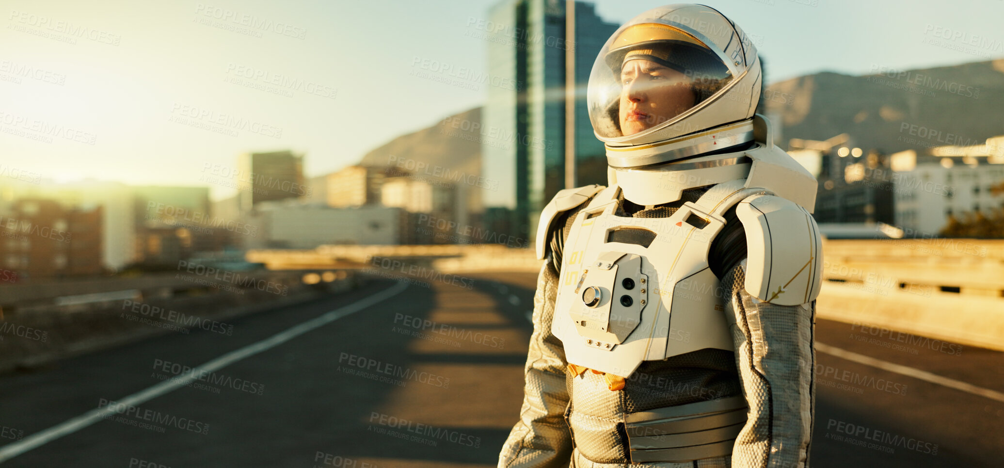 Buy stock photo Woman, thinking and astronaut in city highway for survival, planet dystopia and spacesuit of aerospace mission. Earth. person and view for emergency safety, sci fi journey or adventure of urban world