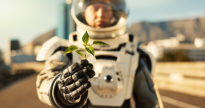 Buy stock photo Person, astronaut and outside with plant in city for scientific research, mission and experiment for environment. Safety  gear, outdoor and portrait for growth, discovery and eco friendly project