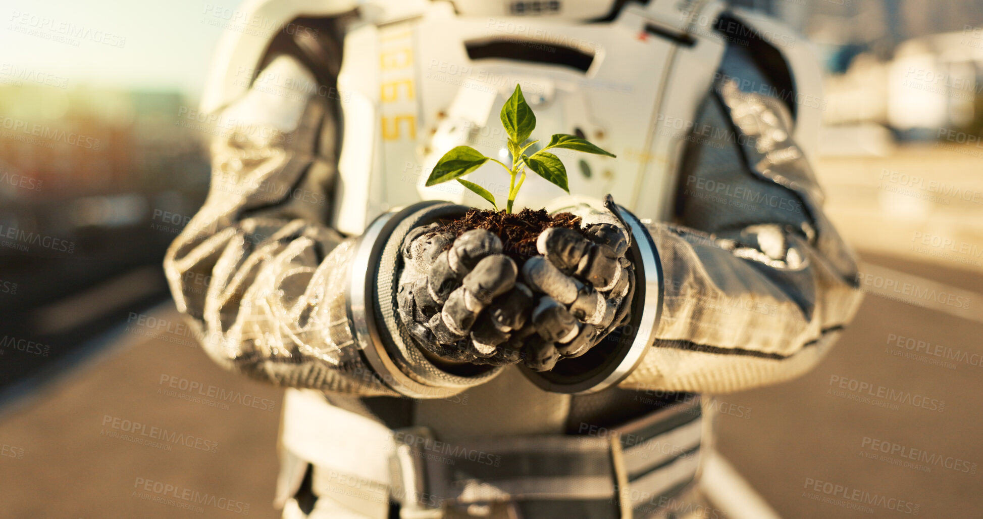 Buy stock photo Hands, astronaut and outdoor with plant in city for scientific research, mission and experiment for environment. Spacesuit, closeup and person for growth, ecology and eco or green friendly project