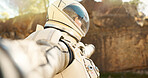 Astronaut, outdoor and tourism of planet, helmet and suit for protection, explore and mission in mars. Travel, journey and person in trip, spaceman and adventure for discovery, explorer and gravity