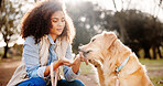 Travel, woman and dog in park, comfort and bonding together with happiness, nature and cheerful. Fur, outdoor and person with pet lover, smile and animal with trees, carefree and weekend break