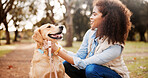 Portrait, woman and dog in park, love and bonding together with happiness, comfort and cheerful. Face, outdoor and person with pet lover, playing and animal with trees, carefree and weekend break