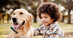 Portrait, boy and dog in park, comfort and bonding together with happiness, weekend break and cheerful. Face, outdoor and kid with pet lover, childhood and animal with trees, carefree and smile