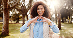 Portrait, outdoor and woman with heart hands, support and nature with kindness, trust and care. Face, person and girl in park, gesture and happiness with emoji, sign and symbol for love and kindness