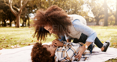 Buy stock photo Tickle, playing and mom in park with child for bonding, outdoor fun and laughing on blanket. Picnic, relax and happy woman with son in nature for playful morning together with love, support and trust