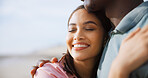 Love, hug and smile with couple at beach for travel destination, summer and honeymoon vacation. Relax, tropical and adventure with man and woman on date for holiday, bonding and romance together
