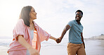 Happy, holding hands and walk with interracial couple at beach for travel destination, summer or honeymoon vacation. Relax, tropical and adventure with man and woman for holiday, bonding or romance