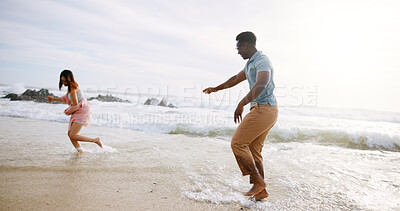 Buy stock photo Happy, sand and couple running at the beach for holiday and summer vacation with travel by ocean. Hawaii, fun and tropical with sea water and people on an island with freedom and sunshine outdoor