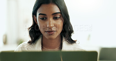 Buy stock photo Face, laptop and remote work with Indian woman in home office for information, report or research. Computer, creative and design with developer person in apartment for social media management