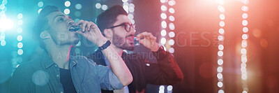 Buy stock photo Shot of two guys drinking shot at the bar counter in a nightclub