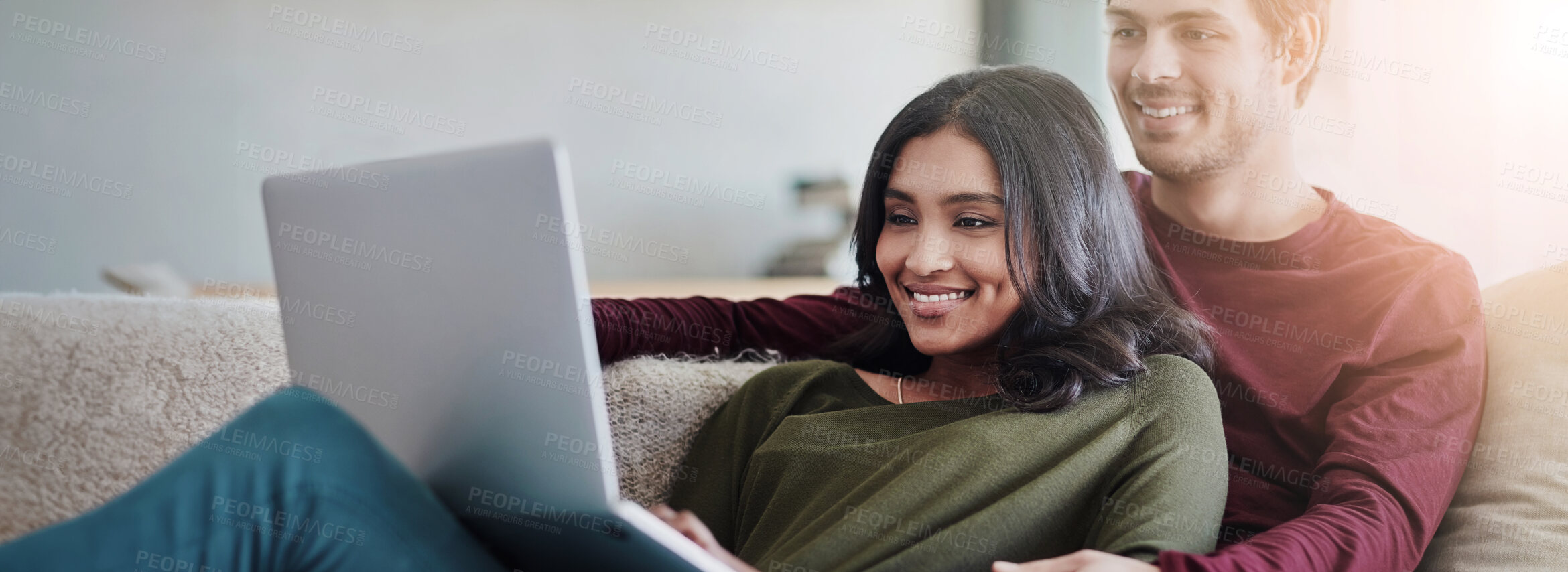 Buy stock photo Couple, watch and laptop for movies, bonding and entertainment with subscription on sofa and lounge. People, man and woman with computer, enjoy and internet for video, home and cozy for date on couch