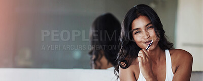 Buy stock photo Portrait of a happy young woman brushing her teeth in the bathroom at home