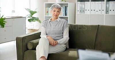 Buy stock photo Psychology, therapist and mature woman on sofa for counseling, help or discussion in anxiety. Mental health, support or person on couch with psychologist for consultation, trauma or stress management