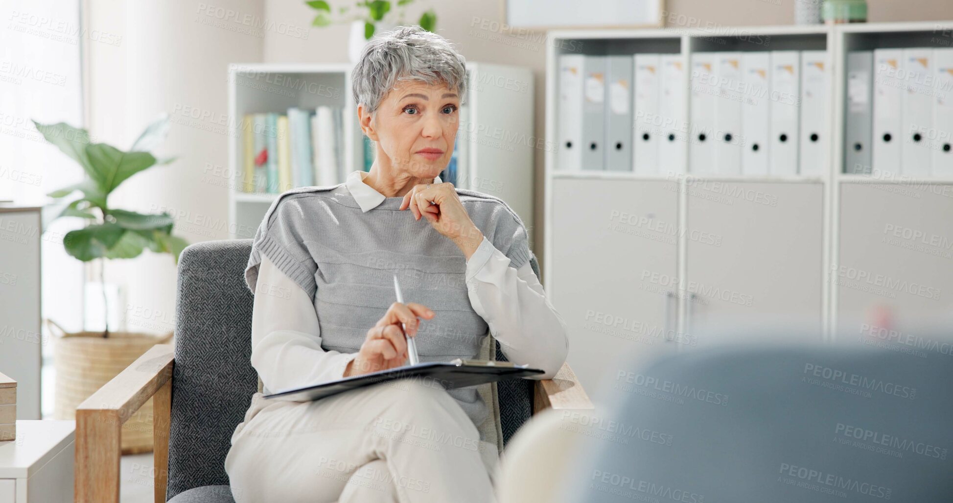 Buy stock photo Therapist, patient and senior woman in office, listening and sad with emotional reaction. Psychologist, old person and medical with professional, healthcare and depression with clipboard and anxiety