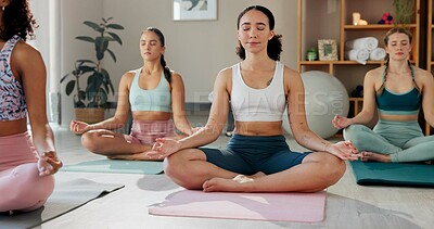 Buy stock photo Meditation, yoga and lotus pose with women in class for mindfulness, health and wellness. Zen balance, spiritual and healing aura with people and holistic practice for relax, awareness or energy