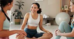 Women, friends and smile for yoga in home for health, peace and bonding with support. People, house and happy or laughing with hobby in sportswear for wellbeing, self care and zen on break and rest