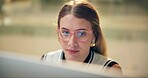 Night, woman and glasses in office for programming, coding or problem solving for deadline. Programmer, late or reading on computer for information, company web development or engineering in overtime