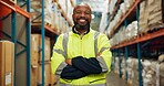 Portrait, black man and confident at warehouse for distribution, logistics industry and package inventory. Male person, arms crossed and inspection for supply chain, freight and safety of production