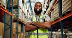 Black man, arms crossed and happy in warehouse on portrait for manufacturing as manager in Uganda. Male person, employee and smile with confidence at wholesale for package, supply chain and delivery