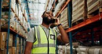 Black man, phone call and logistics at warehouse for distribution, inspection and package inventory. Male person, mobile and discussion for order storage, quality control and supply of stock at depot