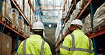 Man, employees and warehouse with inspection for manufacturing, delivery and stocktake. Back, business people and teamwork or collaboration with meeting for supply chain, logistics and parcel