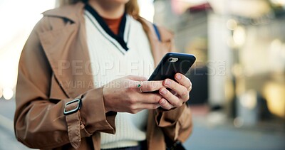 Buy stock photo Woman, phone and hands in street to travel with taxi app, transport and morning commute in city. Professional, person and smartphone for cab location, trip details and ride service on road sidewalk