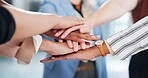 Employees, hands and stack in huddle for team building, office support and motivation for goals. Business people, pile and circle for staff collaboration in workplace, solidarity and meeting closeup