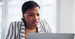 Frustrated, black woman and confused with laptop for bad news, mistake or review at office. Young African, female person or annoyed employee with expression in disappointment on computer for debt