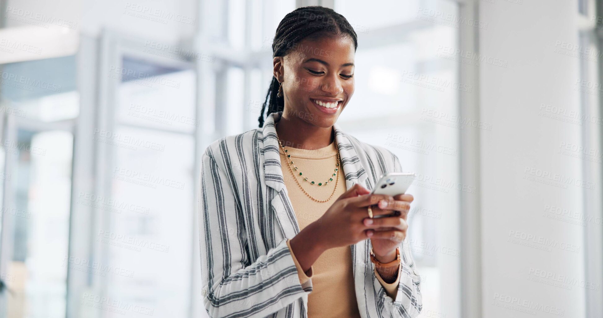 Buy stock photo Business, typing and black woman with cellphone, smile and internet with connection in office. African person, employee and consultant with smartphone, message and online reading with text to contact