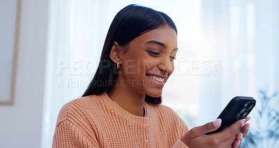 Buy stock photo Home, Indian woman and online with smartphone for chat, text message and communication with contact. House, female person or phone with mobile app for scroll, share reel and dating website with smile