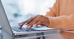 Hands, typing and woman with laptop by desk in home with freelance project for creative startup. Technology, communication and closeup of female pr entrepreneur with online email report for client.