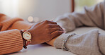 Home, holding hands and women with comfort, help and compassion in living room. Closeup, people and friends with grief, loss and sad with love, unity and trust with empathy, sympathy and support