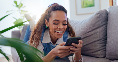 Buy stock photo Woman, sofa and phone with scroll in home for social media browsing, reading ebook or smile for text message. Girl, person or laughing with smartphone on couch for relax or funny comment on blog post