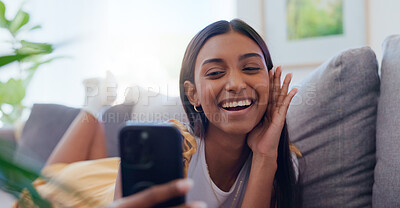 Buy stock photo Selfie, home and woman on sofa, smile and relax with social media, happiness and silly in living room. Person, apartment and girl with cellphone, cheerful and funny with profile picture and joyful