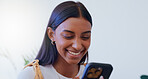 Girl, laughing and phone with scroll in home for social media browsing, reading funny ebook or smile for text message. Indian woman, person and happy with smartphone for relax or comment on blog post