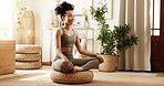 Home, yoga and woman with meditation, wellness and peace with chakra, spiritual routine or calm. Apartment, healthy person or girl with break, lotus or posture with exercise or fitness in living room