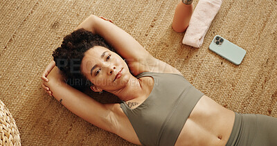 Buy stock photo Break, thinking and woman on floor, fitness and peace in weekend, calm and wellness with workout. Exercise, relax and contemplating on ground, above and person in gym, bottle and serious for health