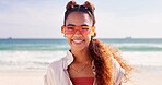 Travel, sunglasses and portrait of woman at beach for vacation, holiday and weekend in nature. Happy, summer fashion and person by ocean, sea and outdoors for adventure, relax and fun in Brazil