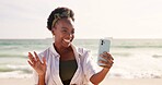 Happy, black woman and waving with selfie at beach for memory or photography in nature. Young African, female person or hipster with smile for picture, moment or holiday vacation by ocean coast