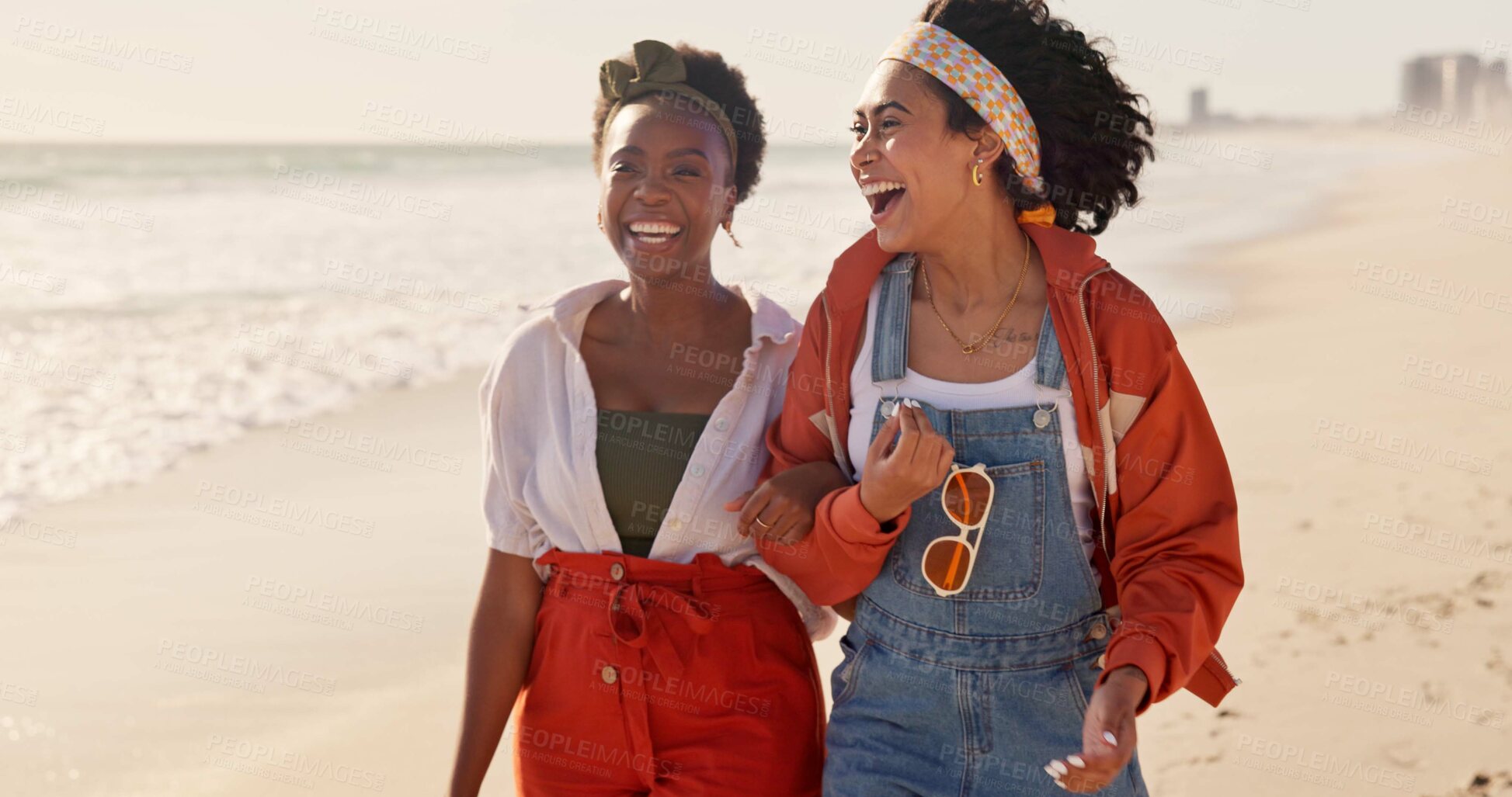 Buy stock photo Friends, beach and laughing together on sand, outdoor freedom and weekend trip to ocean waves. Women, people and travel to sea with energy for funny conversation, humor and holiday for joke in Dubai